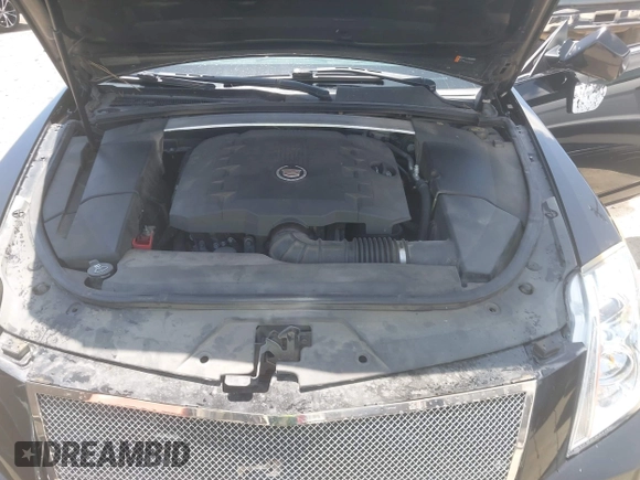 2012 Cadillac CTS Performance z VIN 1G6DJ1E31C0139231, wystawiony jako IAAI lot #42446853 z przebiegiem 102 857 mil mil oraz . Historia ofert i sprzedaży dostępna na DreamBid. Obrazek 10.