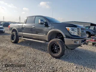2017 Nissan Titan Platinum Reserve with VIN 1N6BA1F43HN568650, listed as a Copart auction lot 59593525 with 126,193 mi miles and Salvage title. Bid and sale history available at DreamBid. Image 4.