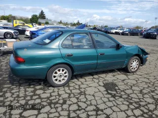 1996 Chevrolet Prizm z VIN 1Y1SK5285TZ058572, wystawiony jako Copart lot #51303845 z przebiegiem 87 109 mil mil oraz Szkoda całkowita • Salvage title. Historia ofert i sprzedaży dostępna na DreamBid. Obrazek 3.