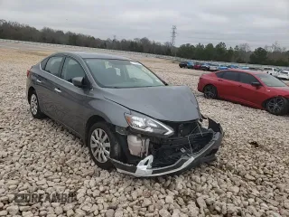 2019 Nissan Sentra S z VIN 3N1AB7AP3KY213698, wystawiony jako Copart lot #77969284 z przebiegiem 80 439 mil mil oraz Szkoda całkowita • Salvage title. Historia ofert i sprzedaży dostępna na DreamBid. Obrazek 11.