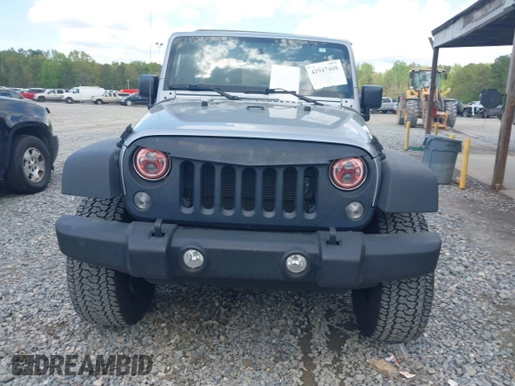 2014 Jeep Wrangler Unlimited Sport with VIN 1C4BJWDG3EL135351, listed as a IAAI auction lot 41947408 with 104,460 mi miles. Bid and sale history available at carsss.com. Image 12.