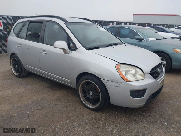 2008 Kia Rondo EX with VIN KNAFG526487135597, listed as a IAAI auction lot 41497631 with 202,426 mi miles. Bid and sale history available at carsss.com. Image 1.