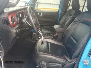2021 Jeep Wrangler Unlimited Rubicon with VIN 1C4JJXFM4MW617635, listed as a Copart auction lot 58956205 with 52,995 mi miles and Salvage title. Bid and sale history available at DreamBid. Image 7.