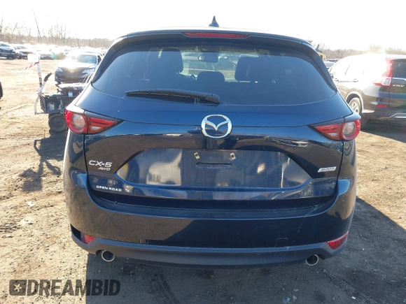 2017 Mazda CX-5 Grand Touring with VIN JM3KFBDL0H0104806, listed as a IAAI auction lot 41621964 with 60,728 mi miles. Bid and sale history available at carsss.com. Image 17.