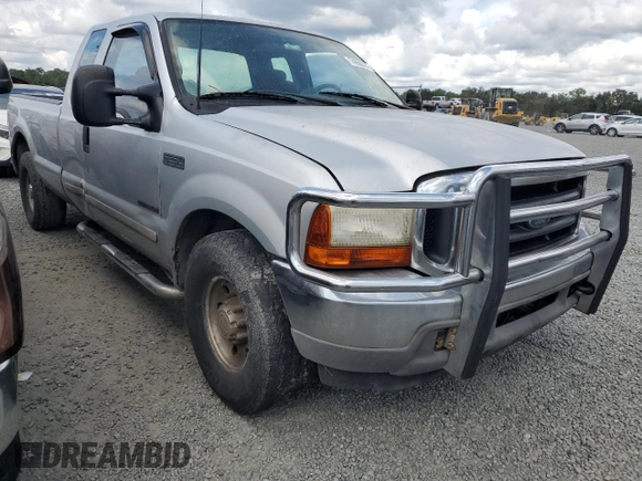 2001 Ford Super Duty F-250 XL with VIN 1FTNX20F61EB23095, listed as a Copart auction lot 74060304 with 458,656 mi miles and Salvage Title. Bid and sale history available at carsss.com. Image 4.