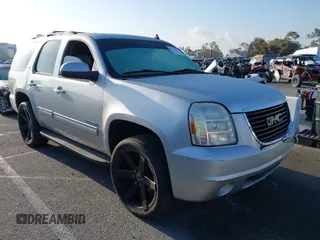 2010 GMC Yukon SLT with VIN 1GKUCCE00AR255901, listed as a IAAI auction lot 42149960 with 196,014 mi miles. Bid and sale history available at carsss.com. Image 1.