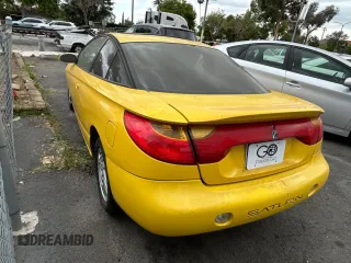 2001 Saturn SC with VIN 1G8ZY12771Z105142, listed as a Copart auction lot 54940825 with 166,396 mi miles and Clean Title. Bid and sale history available at carsss.com. Image 3.