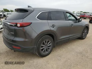 2021 Mazda CX-9 Touring z VIN JM3TCACY1M0502783, wystawiony jako Copart lot #53551935 z przebiegiem 71 373 mil mil oraz Czysty tytuł • Clean title. Historia ofert i sprzedaży dostępna na DreamBid. Obrazek 3.