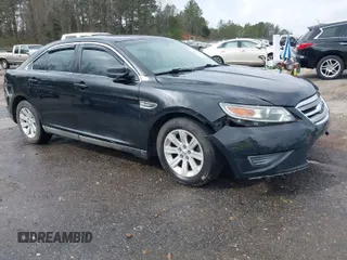 2011 Ford Taurus SE with VIN 1FAHP2DW8BG164136, listed as a IAAI auction lot 41775540 with 199,313 mi miles. Bid and sale history available at carsss.com. Image 1.
