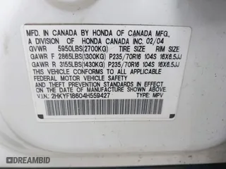 2004 Honda Pilot EX with VIN 2HKYF18604H559427, listed as a IAAI auction lot 42045954 with 361,939 mi miles. Bid and sale history available at carsss.com. Image 9.