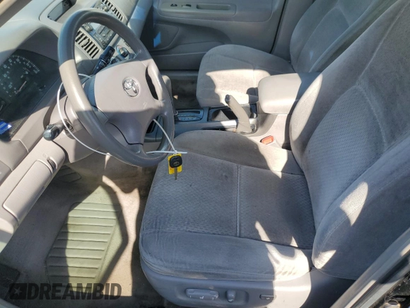 2004 Toyota Camry LE with VIN 4T1BE32K14U318133, listed as a Copart auction lot 54238185 with 293,761 mi miles and Salvage Title. Bid and sale history available at carsss.com. Image 7.
