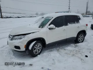 2012 Volkswagen Tiguan S with VIN WVGAV7AX8CW569797, listed as a Copart auction lot 84293714 with 130,883 mi miles and Salvage title. Bid and sale history available at DreamBid. Image 1.
