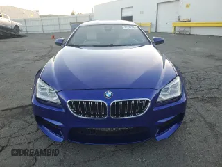 2014 BMW M6 z VIN WBS6C9C5XEDV73722, wystawiony jako Copart lot #87202664 z przebiegiem 68 283 mil mil oraz Szkoda całkowita • Salvage title. Historia ofert i sprzedaży dostępna na DreamBid. Obrazek 5.