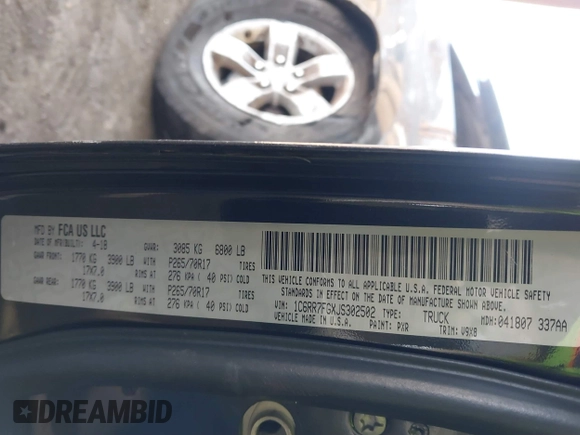 2018 Ram 1500 Express with VIN 1C6RR7FGXJS302502, listed as a IAAI auction lot 40942179 with 91,557 mi miles. Bid and sale history available at carsss.com. Image 9.
