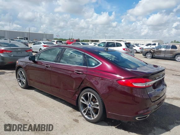 2017 Ford Fusion Titanium with VIN 3FA6P0K97HR214485, listed as a IAAI auction lot 40208619 with 39,265 mi miles and . Bid and sale history available at DreamBid. Image 3.