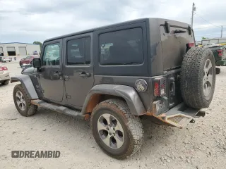 2016 Jeep Wrangler Unlimited Sahara with VIN 1C4BJWEGXGL264740, listed as a Copart auction lot 57225115 with 183,647 mi miles and Salvage title. Bid and sale history available at DreamBid. Image 2.