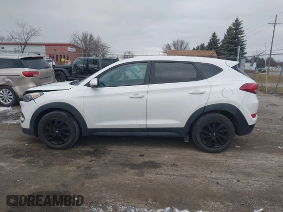 2017 Hyundai Tucson SE with VIN KM8J23A49HU297707, listed as a IAAI auction lot 41257353 with 164,687 mi miles. Bid and sale history available at carsss.com. Image 14.