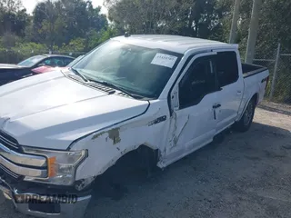 2019 Ford F-150 XL with VIN 1FTEW1E5XKKD48460, listed as a IAAI auction lot 41434707 with 98,431 mi miles. Bid and sale history available at carsss.com. Image 14.