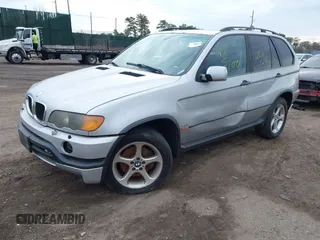 2001 BMW X5 3.0i with VIN WBAFA53571LM67411, listed as a IAAI auction lot 41727600 with 999,999 mi miles. Bid and sale history available at carsss.com. Image 2.
