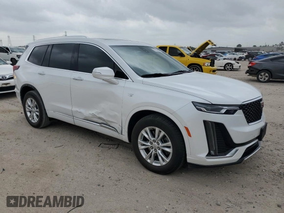 2024 Cadillac XT6 FWD Luxury with VIN 1GYKPAR47RZ720446, listed as a Copart auction lot 51762695 with 10,728 mi miles and Salvage Title. Bid and sale history available at carsss.com. Image 4.
