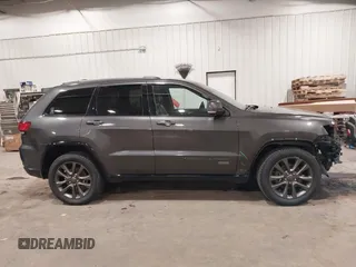 2016 Jeep Grand Cherokee Limited 75th Anniversary with VIN 1C4RJFBG2GC349154, listed as a IAAI auction lot 41392239 with 135,627 mi miles and . Bid and sale history available at DreamBid. Image 13.