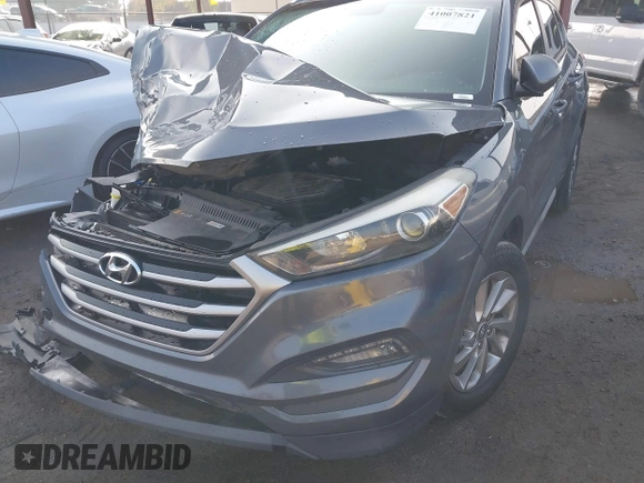 2018 Hyundai Tucson SEL with VIN KM8J33A47JU768935, listed as a IAAI auction lot 41007821 with 125,678 mi miles. Bid and sale history available at carsss.com. Image 6.