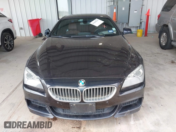 2012 BMW 6 Series 650i z VIN WBALX3C51CDV77602, wystawiony jako IAAI lot #41668235 z przebiegiem 103 684 mil mil oraz . Historia ofert i sprzedaży dostępna na DreamBid. Obrazek 12.