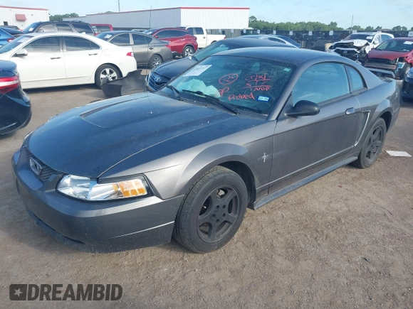2003 Ford Mustang Standard z VIN 1FAFP40463F341216, wystawiony jako IAAI lot #42601357 z przebiegiem 145 520 mil mil oraz . Historia ofert i sprzedaży dostępna na DreamBid. Obrazek 17.
