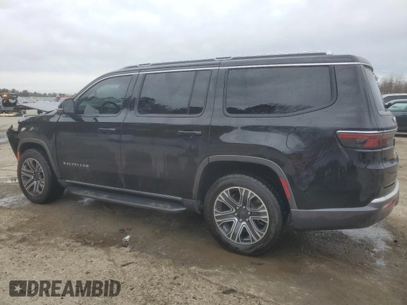 2022 Jeep Wagoneer Series III with VIN 1C4SJUDTXNS115301, listed as a Copart auction lot 89125845 with 60,674 mi miles and Salvage title. Bid and sale history available at DreamBid. Image 2.