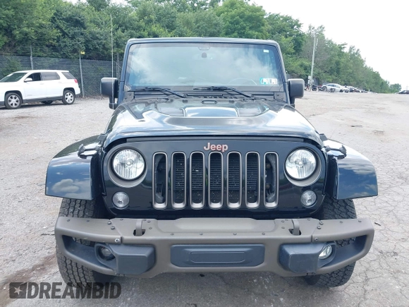 2016 Jeep Wrangler Unlimited Sahara z VIN 1C4HJWEG3GL343340, wystawiony jako IAAI lot #42683859 z przebiegiem 92 878 mil mil oraz . Historia ofert i sprzedaży dostępna na DreamBid. Obrazek 6.