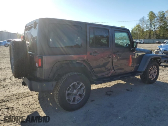 2014 Jeep Wrangler Unlimited Rubicon with VIN 1C4BJWFG4EL256824, listed as a Copart auction lot 49473815 with 117,264 mi miles and Salvage Title. Bid and sale history available at carsss.com. Image 3.