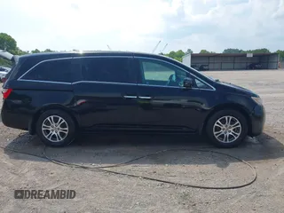 2011 Honda Odyssey EX-L with VIN 5FNRL5H69BB037248, listed as a IAAI auction lot 42613070 with 101,008 mi miles and . Bid and sale history available at DreamBid. Image 13.
