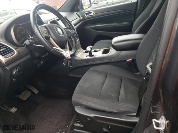 2015 Jeep Grand Cherokee Altitude with VIN 1C4RJFAG0FC209734, listed as a Copart auction lot 52973105 with 130,955 mi miles and Salvage Title. Bid and sale history available at carsss.com. Image 7.