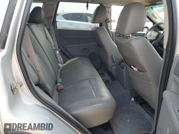 2005 Jeep Grand Cherokee Laredo z VIN 1J4GR48KX5C581833, wystawiony jako Copart lot #60975355 z przebiegiem 149 993 mil mil oraz Szkoda całkowita • Salvage title. Historia ofert i sprzedaży dostępna na DreamBid. Obrazek 10.