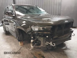 2023 Jeep Grand Cherokee Overland with VIN 1C4RJHDG0P8701157, listed as a IAAI auction lot 42080201 with 24,709 mi miles and . Bid and sale history available at DreamBid. Image 1.