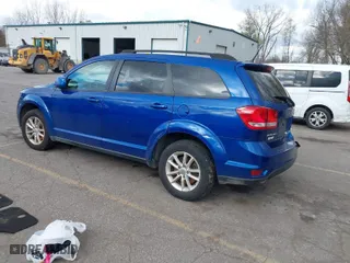 2015 Dodge Journey SXT with VIN 3C4PDCBG1FT743938, listed as a IAAI auction lot 40789907 with 124,781 mi miles. Bid and sale history available at carsss.com. Image 3.