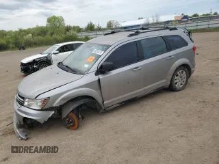 2015 Dodge Journey American Value z VIN 3C4PDCABXFT597898, wystawiony jako Copart lot #56334415 z przebiegiem 190 712 mil mil oraz Szkoda całkowita • Salvage title. Historia ofert i sprzedaży dostępna na DreamBid. Obrazek 1.