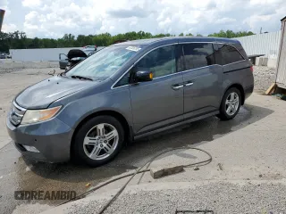 2011 Honda Odyssey Touring with VIN 5FNRL5H92BB061899, listed as a Copart auction lot 63306395 with 199,826 mi miles and Non repairable. Bid and sale history available at DreamBid. Image 1.