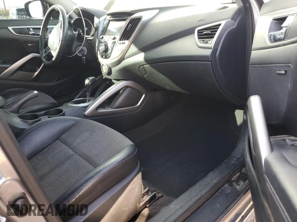 2013 Hyundai Veloster w/Black Int z VIN KMHTC6AD0DU135773, wystawiony jako Copart lot #41367875 z przebiegiem 96 487 mil mil oraz Szkoda całkowita • Salvage title. Historia ofert i sprzedaży dostępna na DreamBid. Obrazek 8.