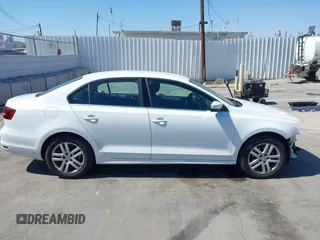 2017 Volkswagen Jetta S with VIN 3VW2B7AJ0HM356506, listed as a IAAI auction lot 42687156 with 96,962 mi miles and . Bid and sale history available at DreamBid. Image 14.