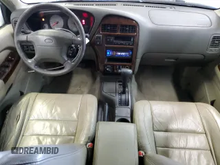 2000 Infiniti QX4 z VIN JNRAR07Y3YW084474, wystawiony jako Copart lot #87089994 z przebiegiem 237 974 mil mil oraz Szkody całkowita. Historia ofert i sprzedaży dostępna na DreamBid. Obrazek 8.