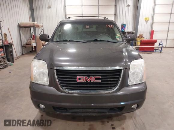 2010 GMC Yukon SLT with VIN 1GKUKCE08AR148548, listed as a IAAI auction lot 41994933 with 248,534 mi miles. Bid and sale history available at carsss.com. Image 12.