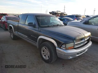 2002 Dodge Dakota SLT with VIN 1B7GL42X42S682184, listed as a IAAI auction lot 41784688 with 168,298 mi miles. Bid and sale history available at carsss.com. Image 1.