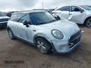 2017 MINI Hardtop Cooper with VIN WMWXP5C35H3C64595, listed as a IAAI auction lot 42078919 with 93,141 mi miles and . Bid and sale history available at DreamBid. Image 1.
