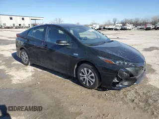 2021 Toyota Prius LE with VIN JTDKAMFP0M3193904, listed as a Copart auction lot 89310885 with 54,068 mi miles and Clean Title. Bid and sale history available at DreamBid. Image 4.