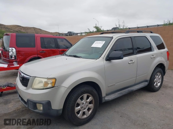 2008 Mazda Tribute Touring with VIN 4F2CZ961X8KM18007, listed as a IAAI auction lot 42035010 with 216,270 mi miles. Bid and sale history available at carsss.com. Image 2.