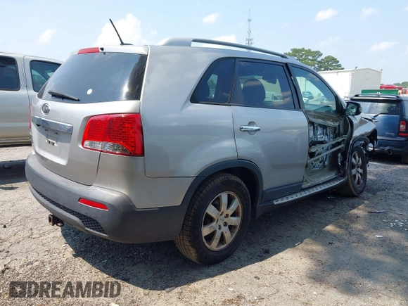 2013 Kia Sorento LX with VIN 5XYKT3A64DG357542, listed as a IAAI auction lot 42402188 with 171,648 mi miles and . Bid and sale history available at DreamBid. Image 4.