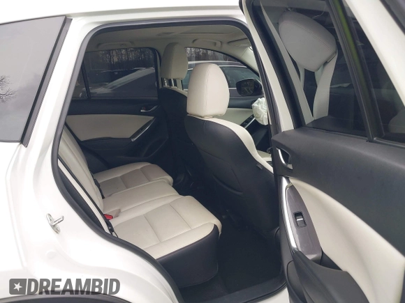 2016 Mazda CX-5 Grand Touring with VIN JM3KE4DY3G0838204, listed as a IAAI auction lot 41961049 with 98,918 mi miles and . Bid and sale history available at carsss.com. Image 8.