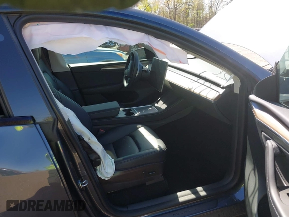 2022 Tesla Model Y Long Range z VIN 7SAYGAEE9NF574634, wystawiony jako IAAI lot #42040719 z przebiegiem 29 675 mil mil oraz . Historia ofert i sprzedaży dostępna na DreamBid. Obrazek 5.