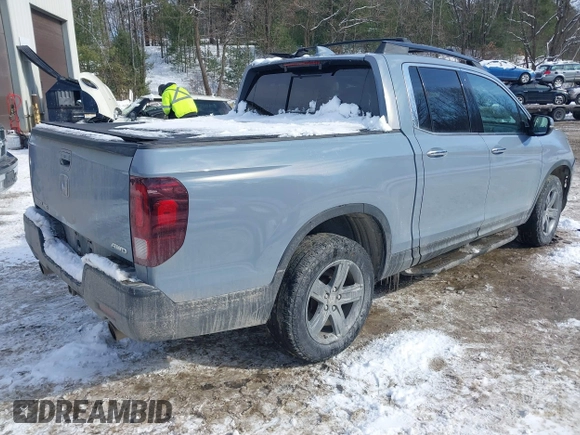 2022 Honda Ridgeline RTL-E with VIN 5FPYK3F73NB035246, listed as a IAAI auction lot 41532768 with 37,116 mi miles and . Bid and sale history available at DreamBid. Image 4.